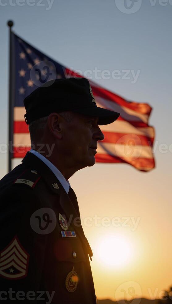An old veteran silhouetted against the setting sun depicted on the U photo
