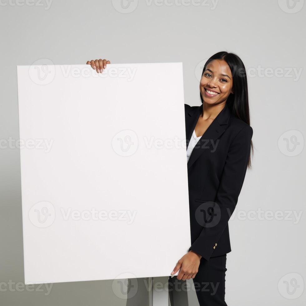 Mockup featuring a large square blank canvas being held by an African American woman photo