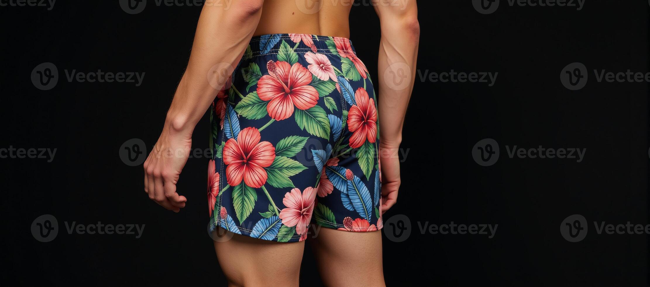 Stylish vibrant hibiscusprinted floral shorts tropical design with an elastic waistband for both beach and casual outfits photo