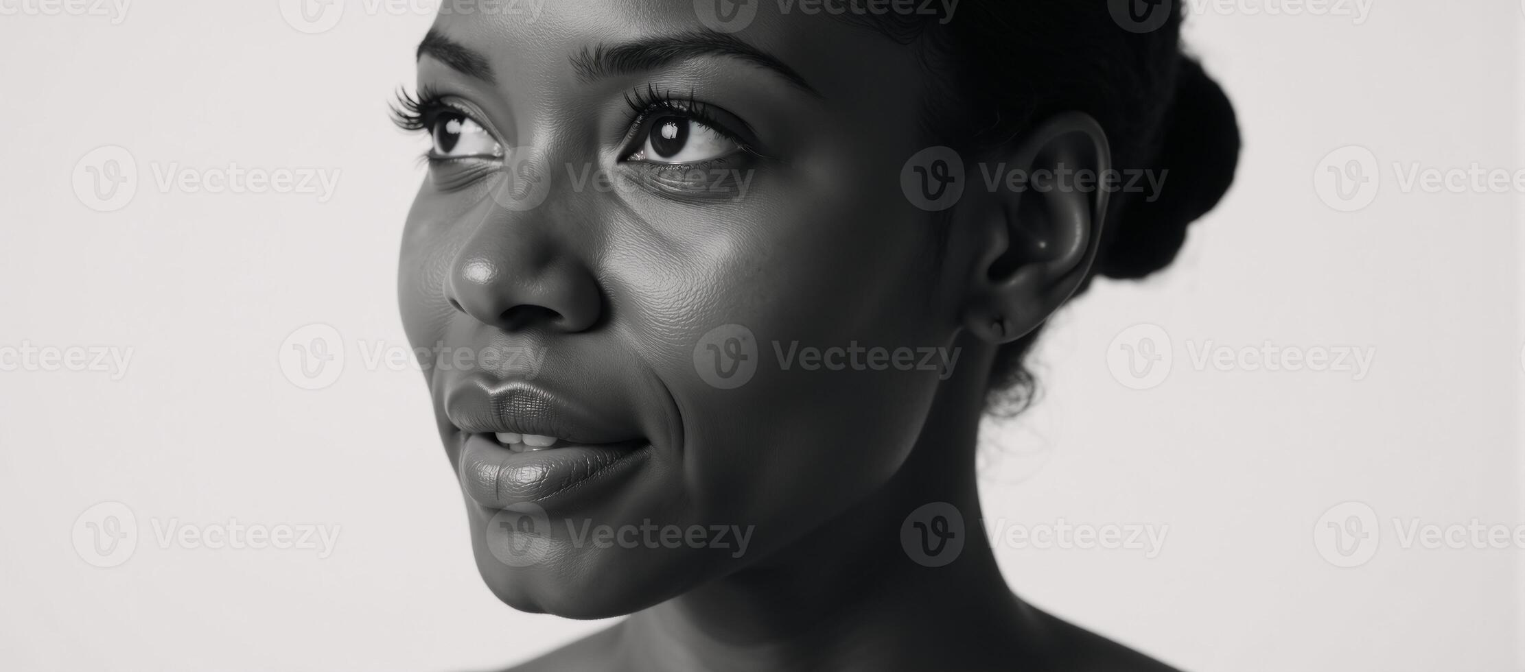 Contemplative portrait showcasing an elegant African American woman photo