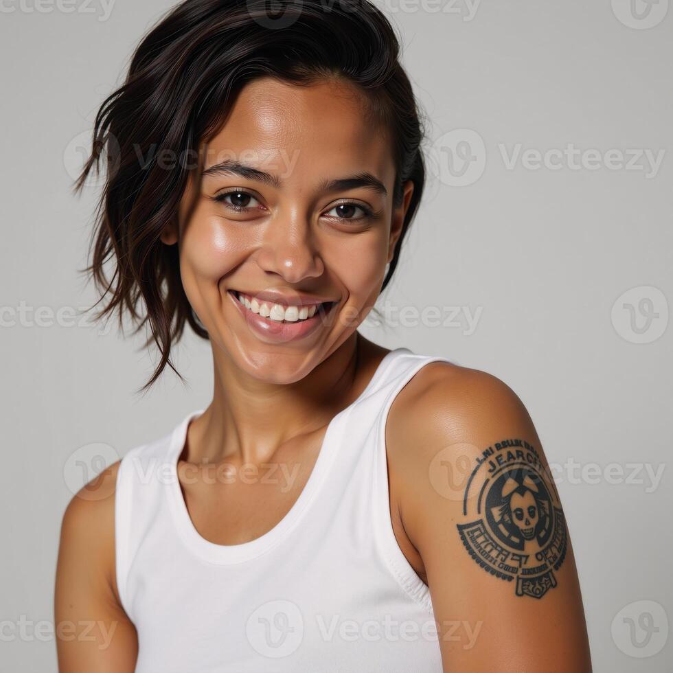 Portrait showcases smiling Generation Z African American woman with tattoos on skin photo