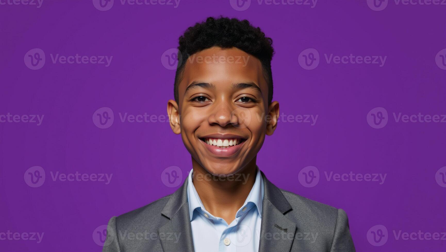 Confident African American teenager with a radiant smile poses in front of a purple studio background symbolizing education and youth with a dash of style photo