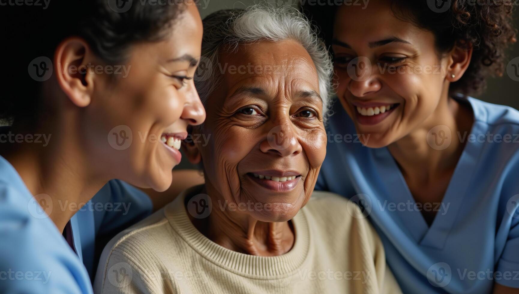 Older AfricanAmerican woman with daughter and nurse present photo