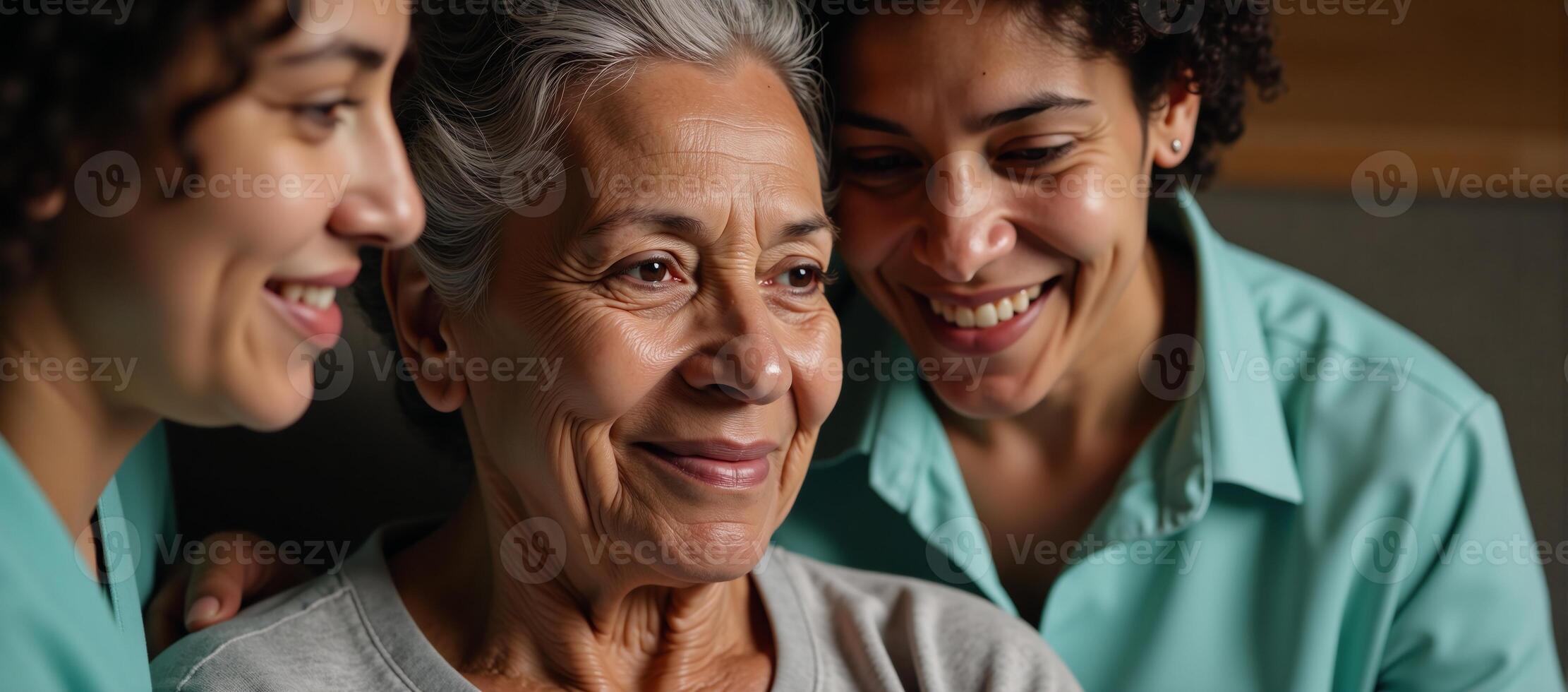 Older AfricanAmerican woman with daughter and nurse present photo