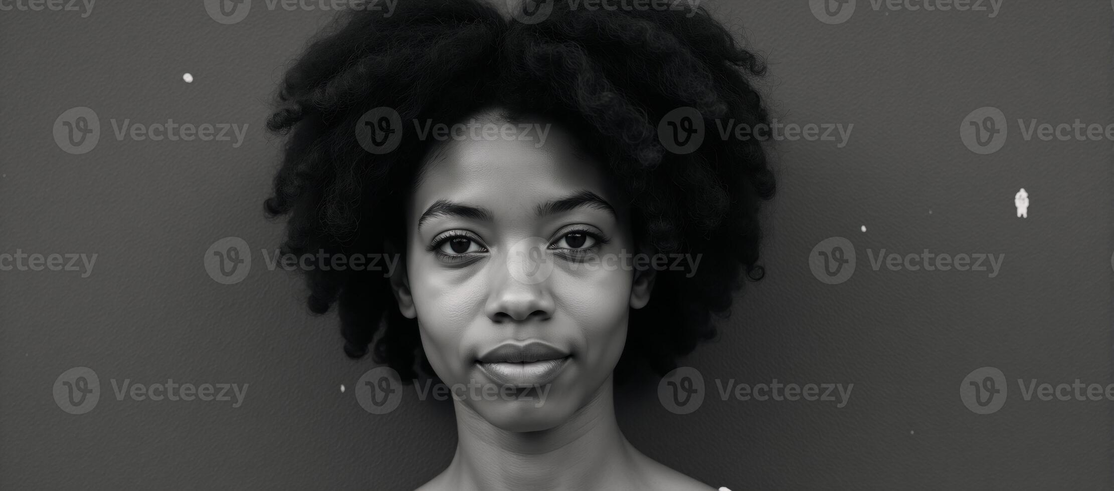 Stylized portrait of an AfricanAmerican woman on rust background showcasing natural hairstyle and beauty fashion theme in abstract minimalism photo