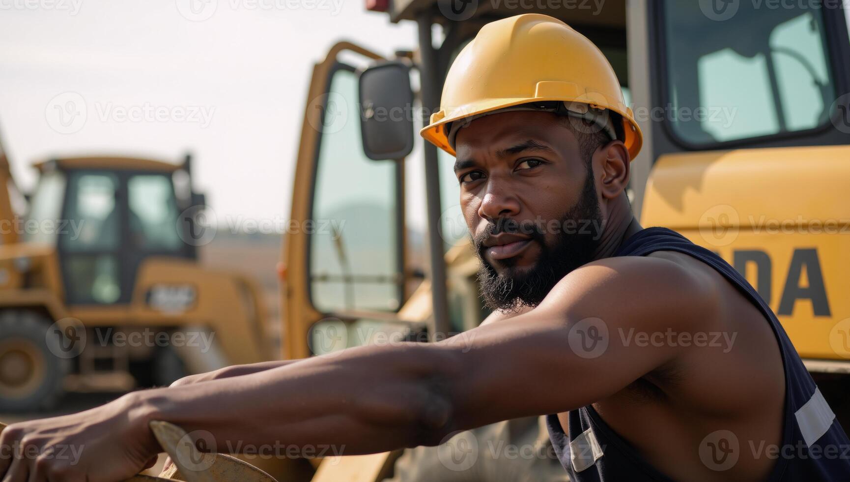 Labor Day celebration showcases a Black African American worker wearing a hard safety hat while working on a construction site photo
