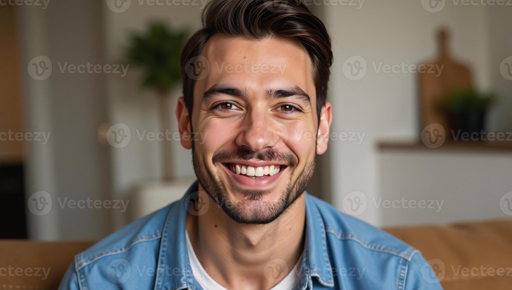 A joyful and radiant mixedrace gay man smiles warmly at home in a comfortable stylish outfit while wearing beaded jewelry photo