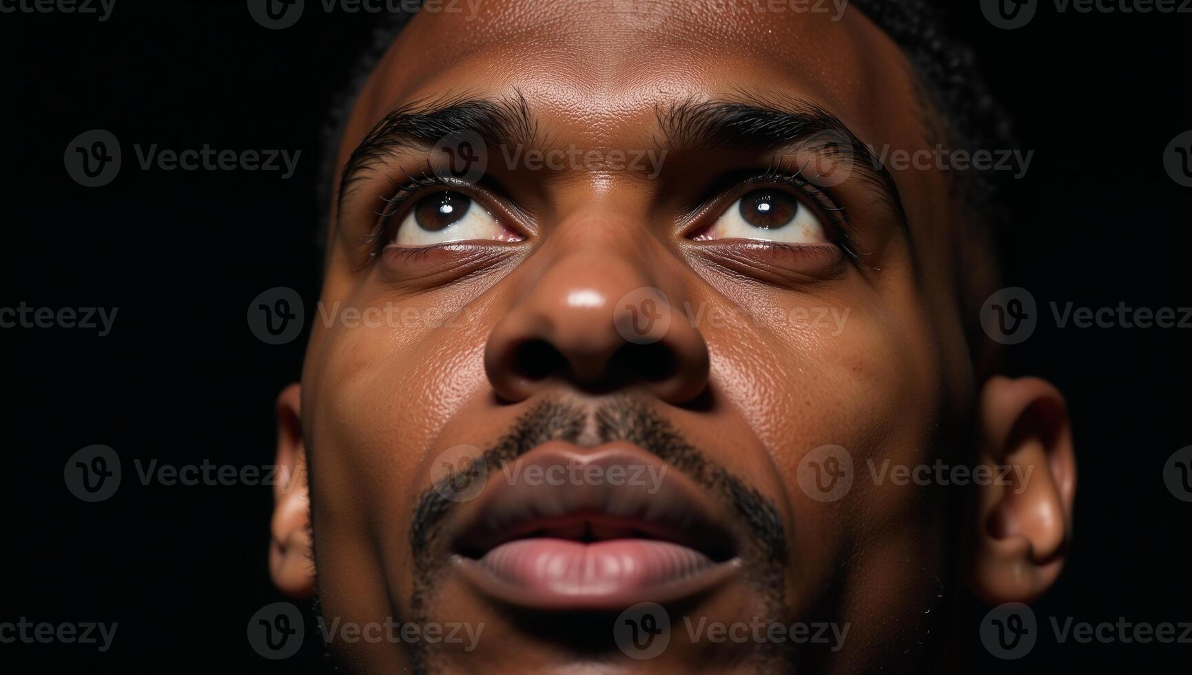 Closeup photo of an introspective African American male