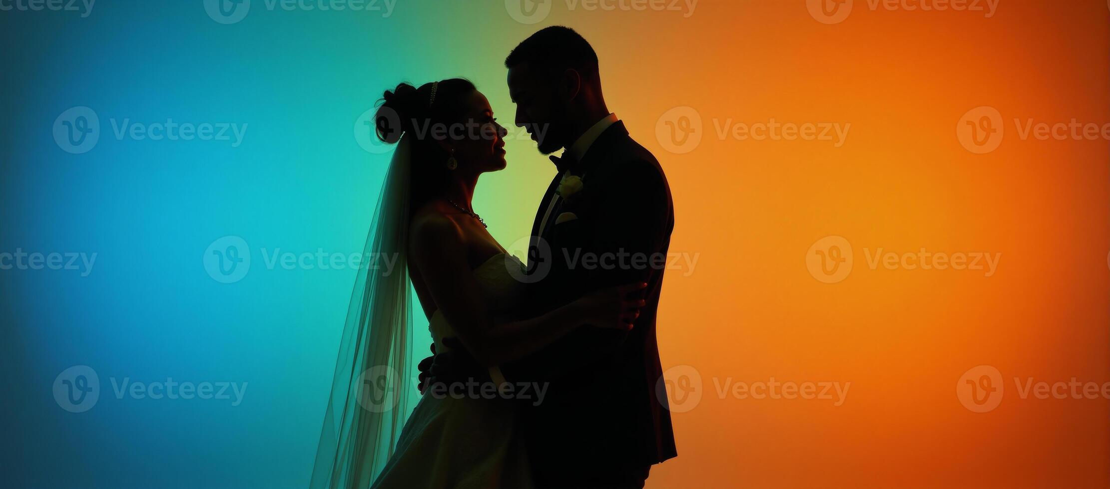 A romantic lovefilled scene showcasing an elegant African American bride and groom as silhouettes surrounded by vivid colors photo