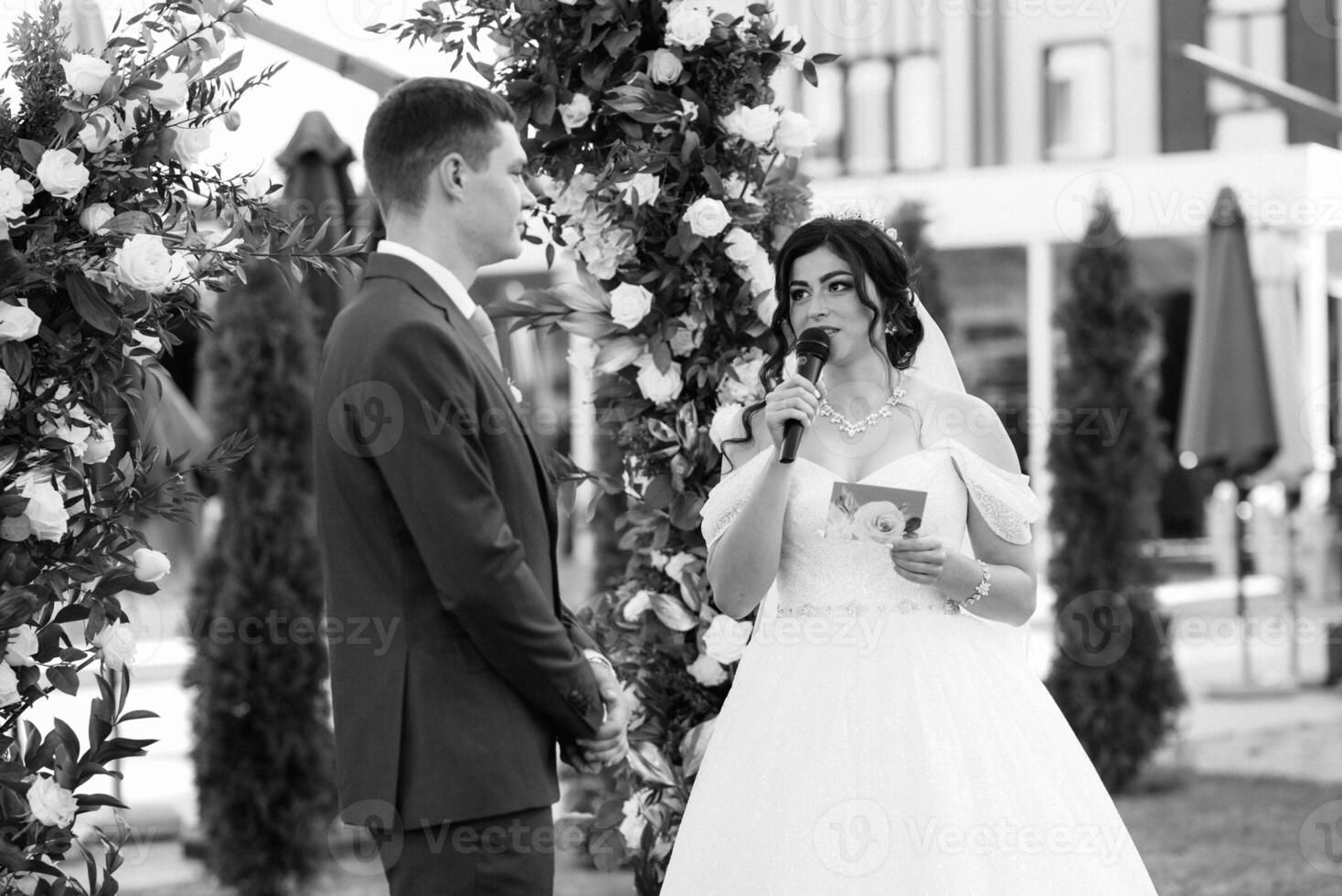 wedding ceremony of the newlyweds on the glade photo
