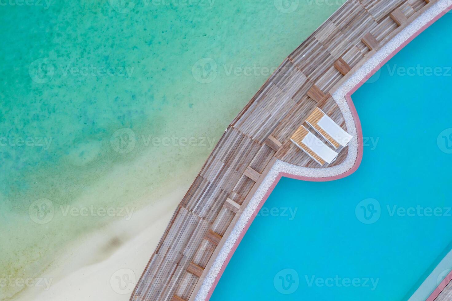 An aerial view of a pool and beach photo