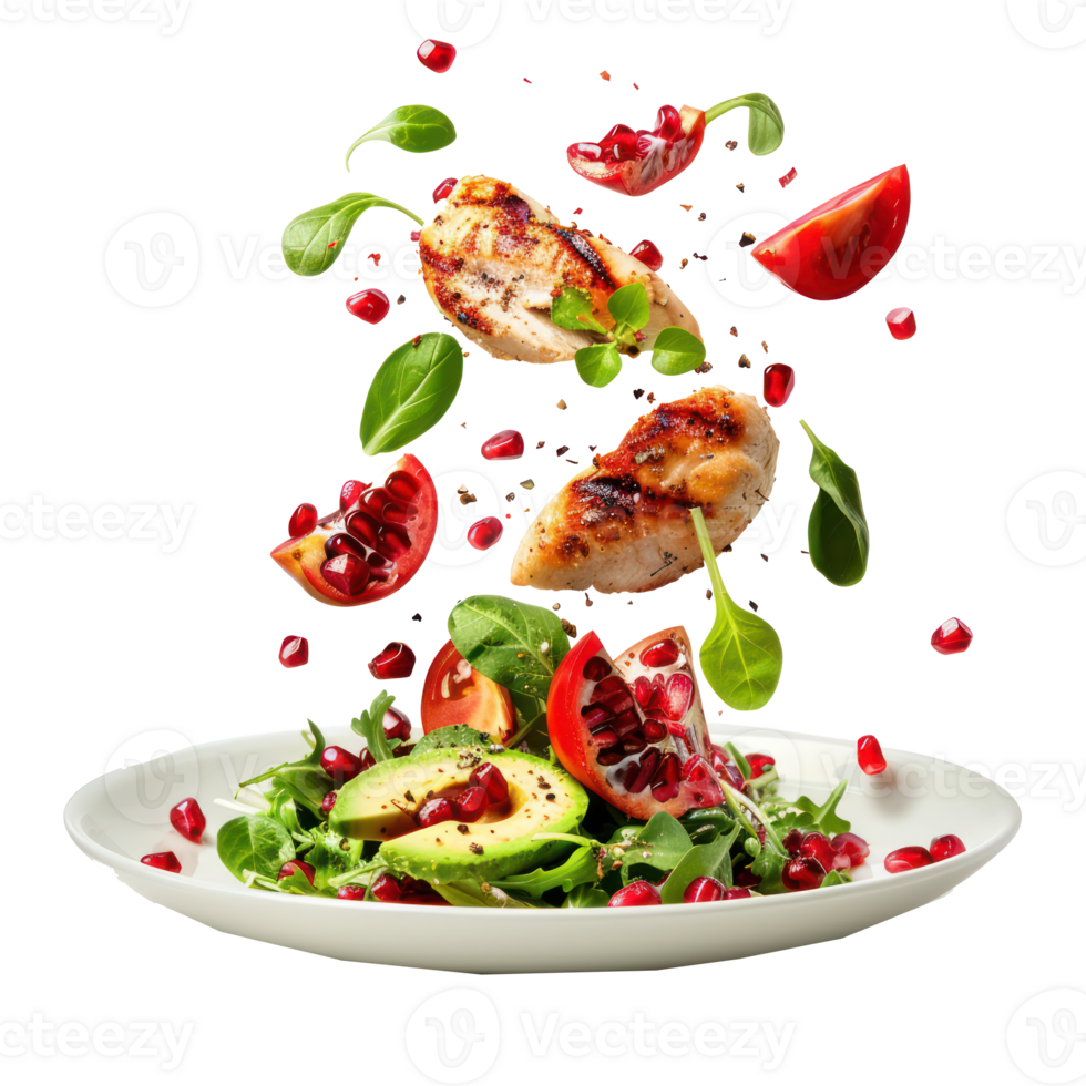 floated Salad with grilled chicken breast, avocado, pomegranate seeds and tomato falling into a plate isolate on transparency background png