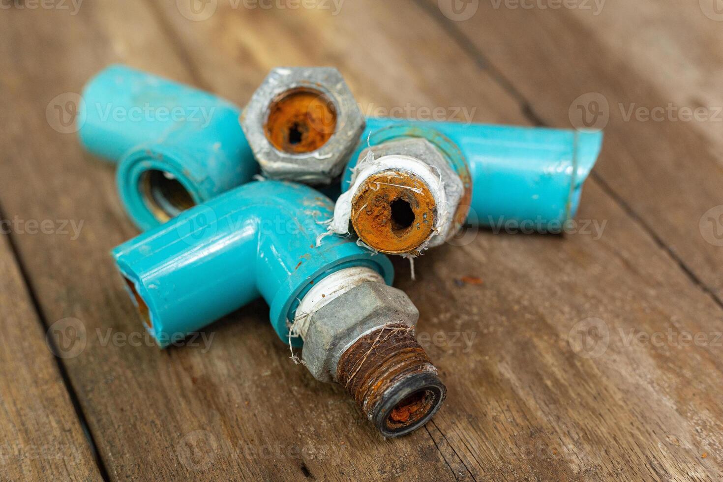 Metal and PVC water pipes and plumbing joints that have been used for long time are made of rusted metal making it difficult for water to flow through. photo