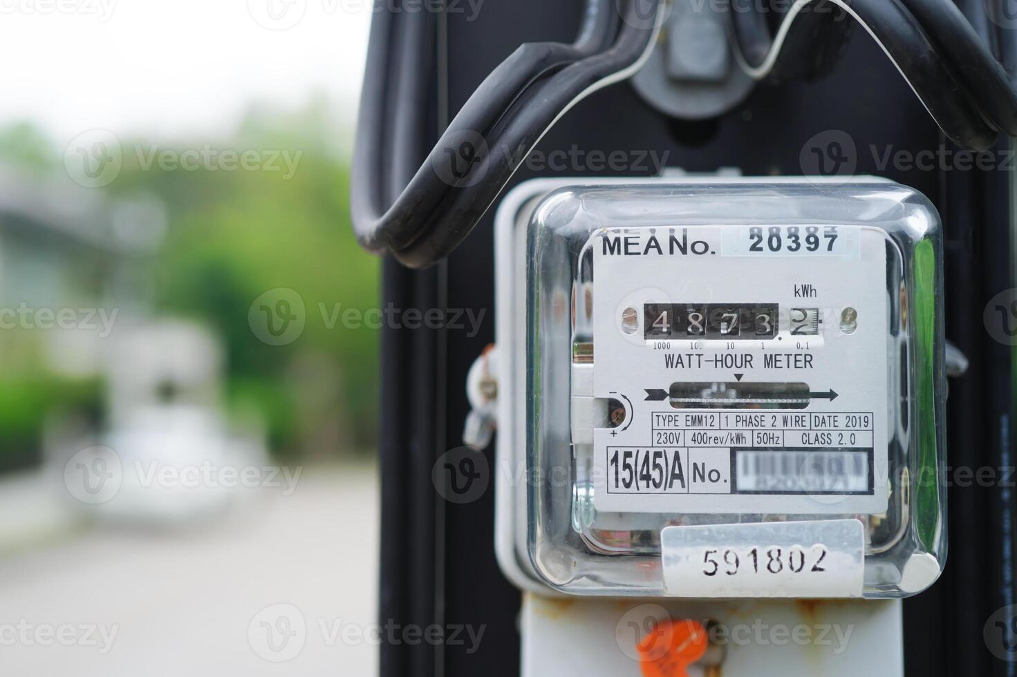 Electric measuring power meter for energy cost at home and office. photo