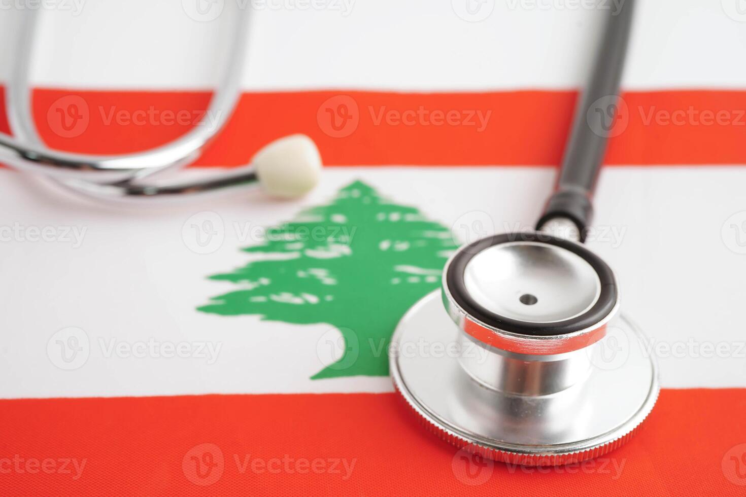 Lebanon flag with black stethoscope, Business and finance. photo