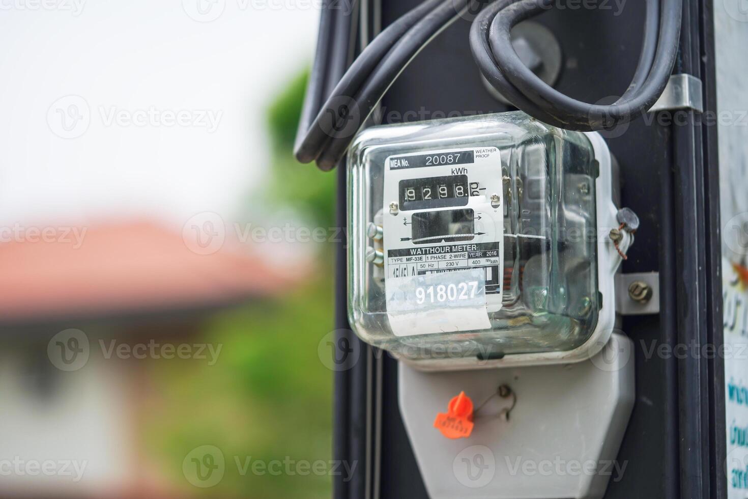 Electric measuring power meter for energy cost at home and office. photo