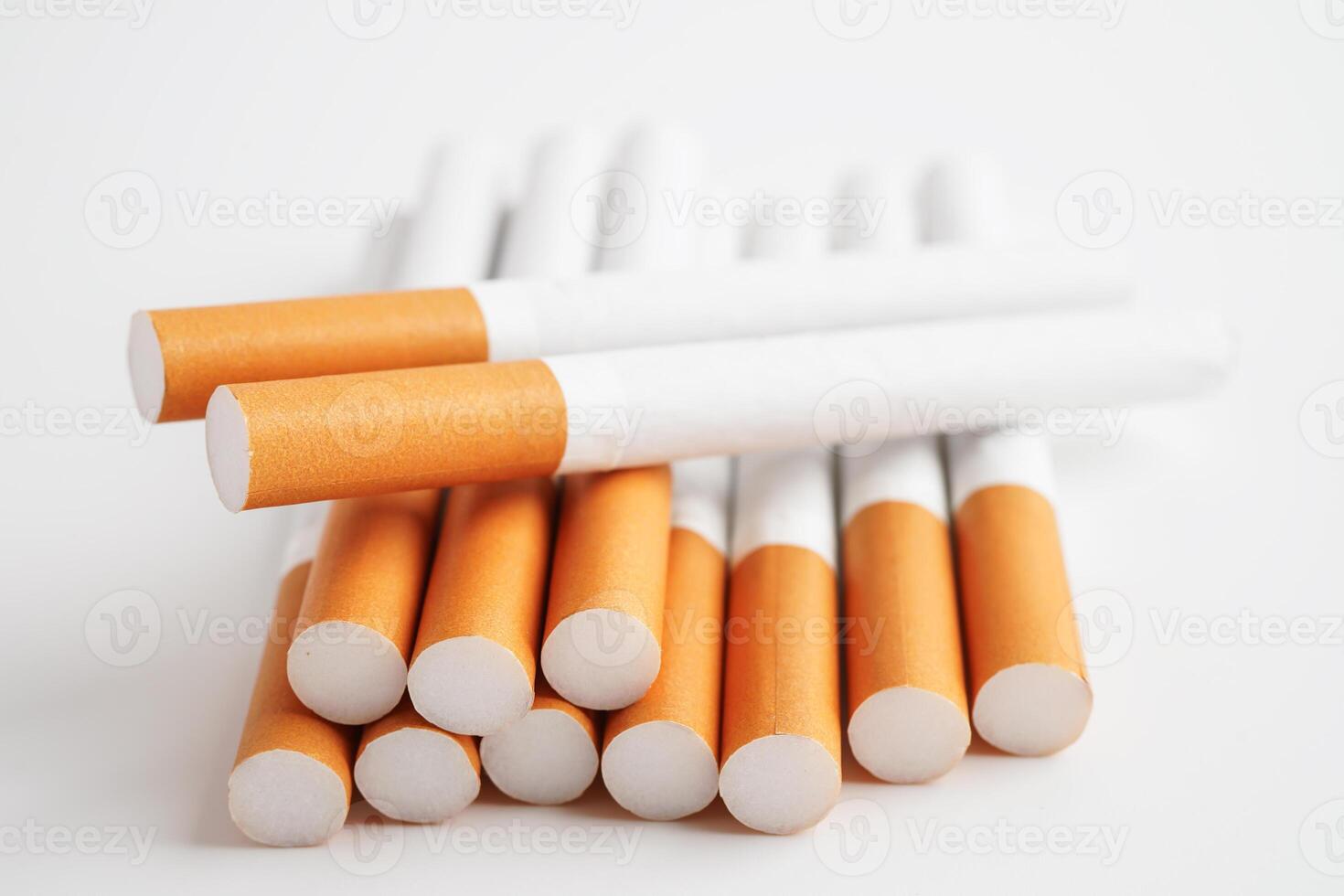 Cigarette, roll tobacco in paper with filter tube, No smoking. photo