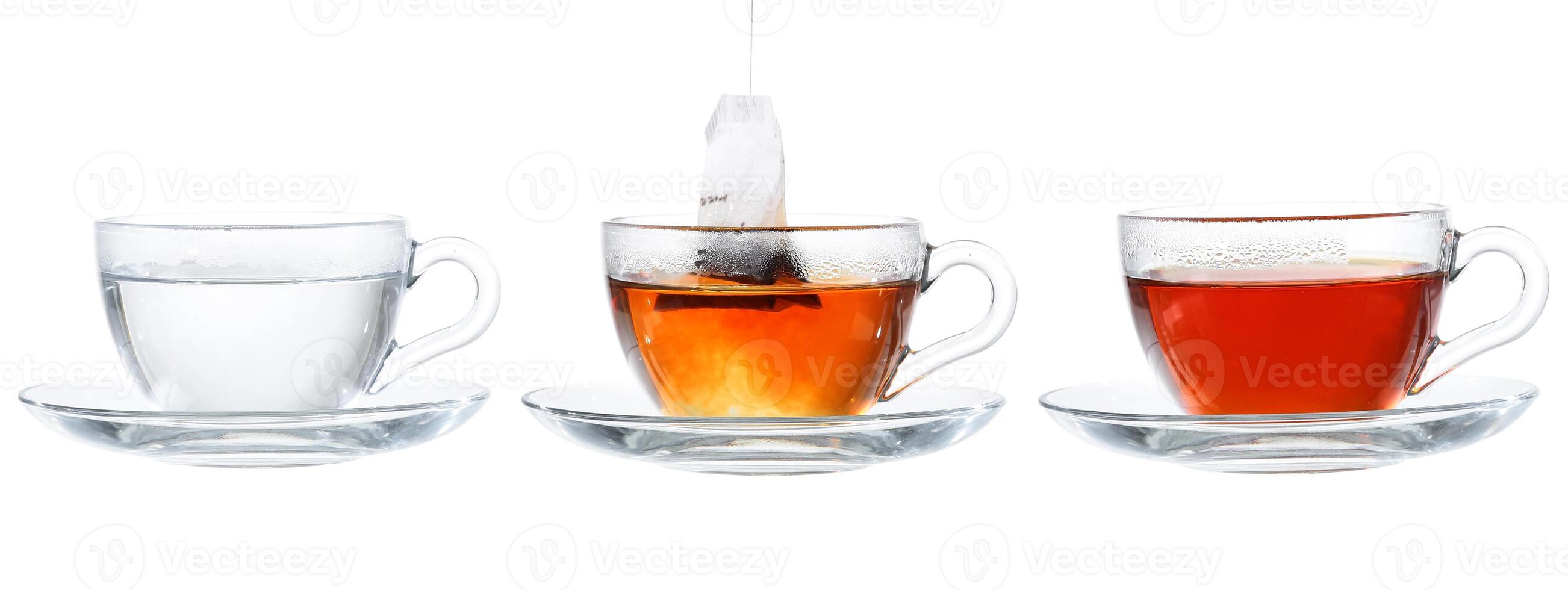 Set of cups with tea isolated on white background. photo