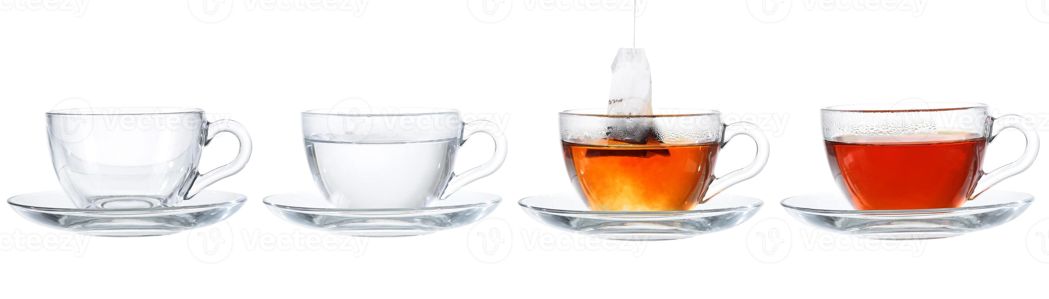 Set of cups with tea isolated on white background. photo