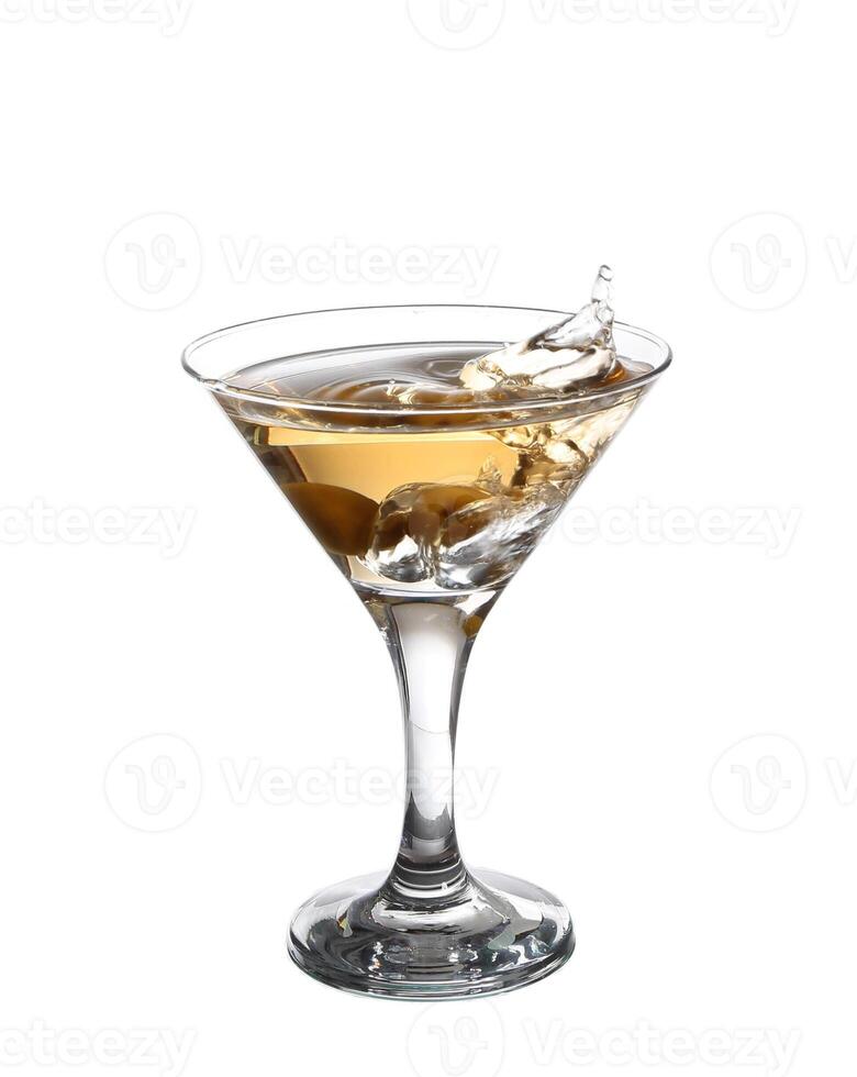 A martini glass on a white background the water ripples and splashed photo