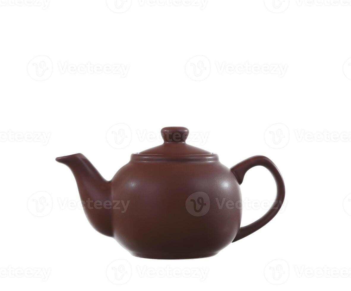 teapot from clay on white background photo