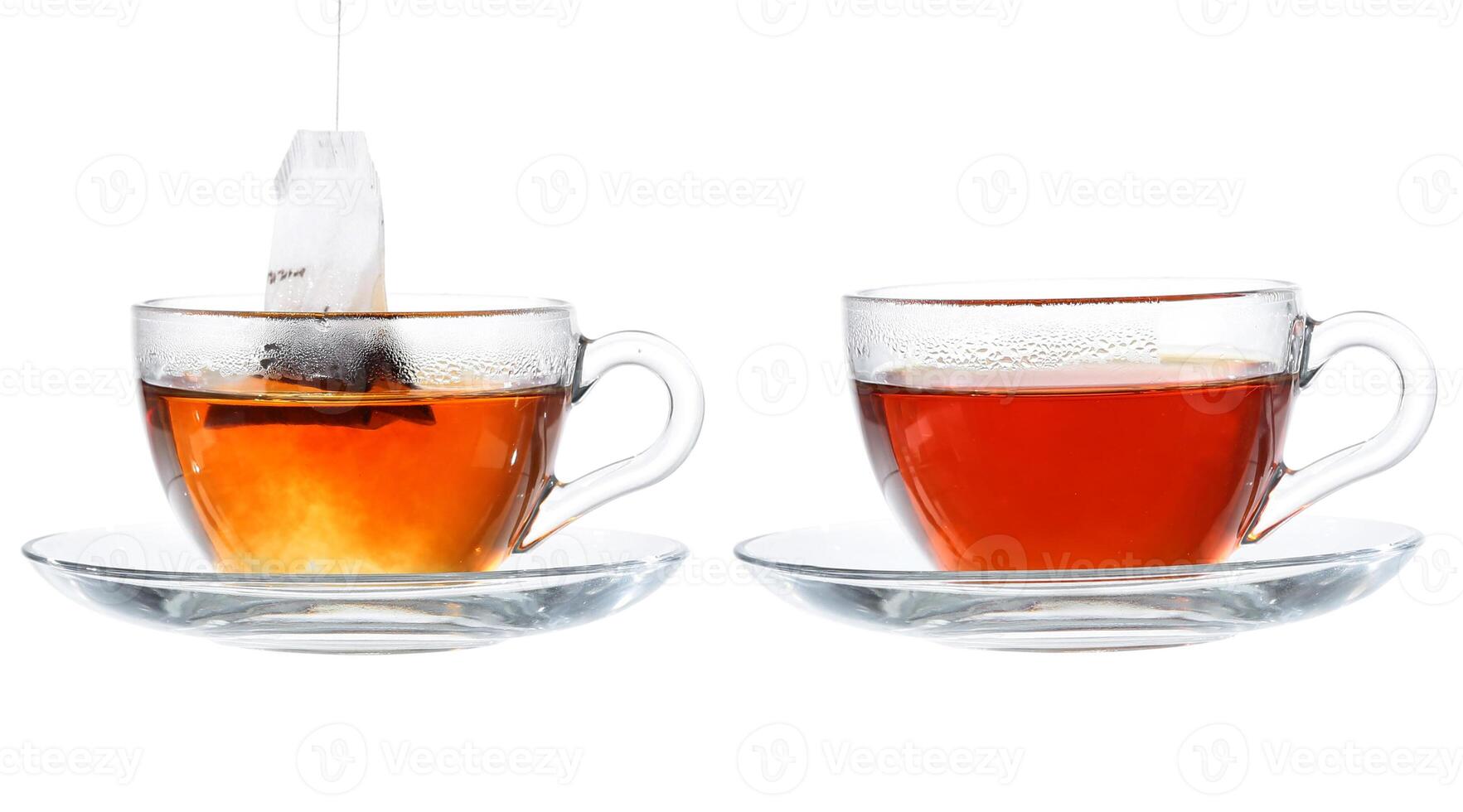Set of cups with tea isolated on white background. photo