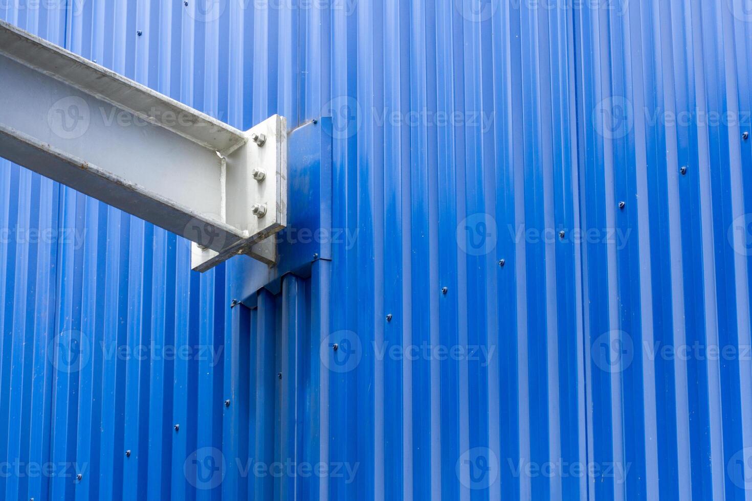 A close up of steel beams creating a geometric pattern in a modern urban architectural structure. The composition showcases industrial design and engineering precision photo
