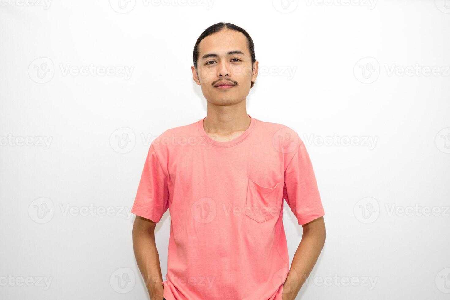 An Indonesian, Asian man wearing a pink tshirt formal style involving his partner with standing confidence like a mature person and a young businessman. isolated in white background photo