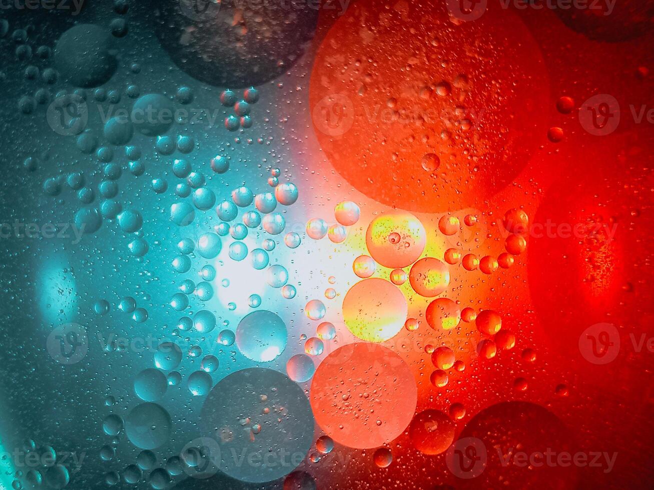 Closeup Shot Of Colorful Abstract Multicolor Water Oil Soap Bubbles Texture Background,Water And Oil Circles Color Water Photo Background.
