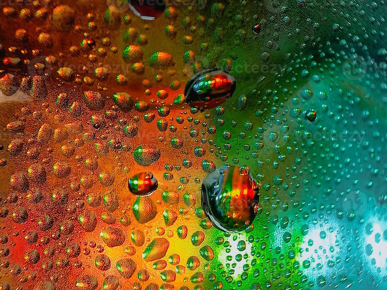 Colorful display showing how water and oil do not mix vivid tones macro shot hdr soothing,Colorful background with water drops on it photo