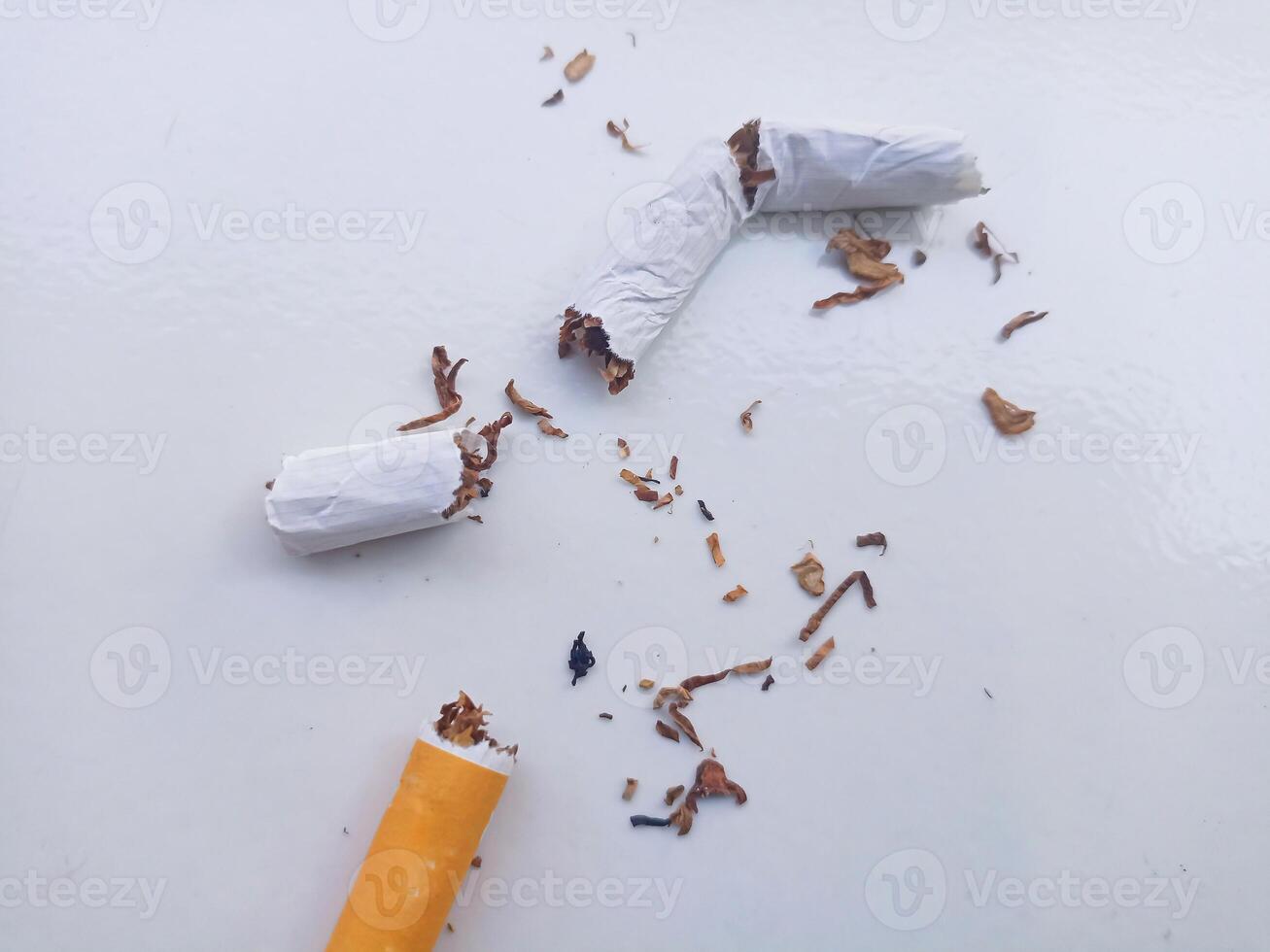 Stop smoking, quit smoking or no smoking cigarettes. Woman holding broken cigarette in hands. Woman refusing cigarettes and lung health concept. photo