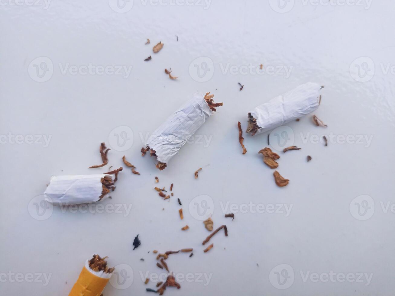 Stop smoking, quit smoking or no smoking cigarettes. Woman holding broken cigarette in hands. Woman refusing cigarettes and lung health concept. photo