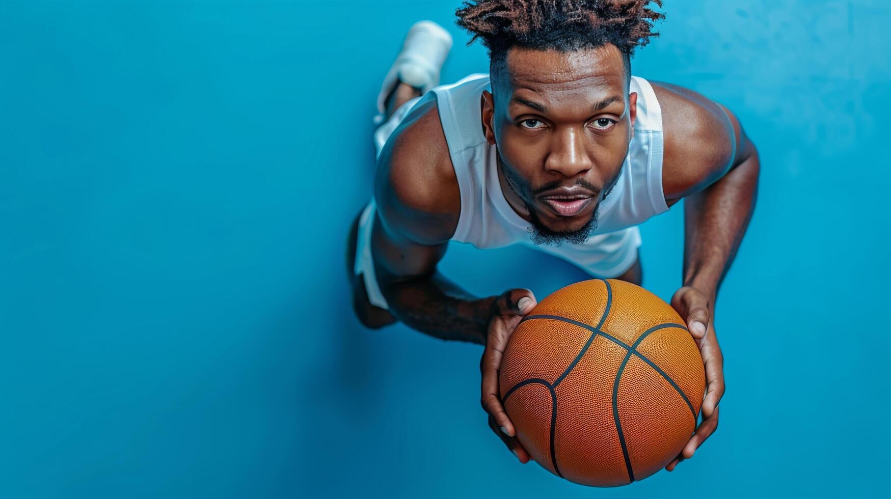 A basketball player prepares to shoot while lying on the court, showcasing dedication and skill photo