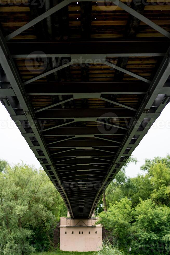 Framework under a bridge over the river Bug in Brest. photo