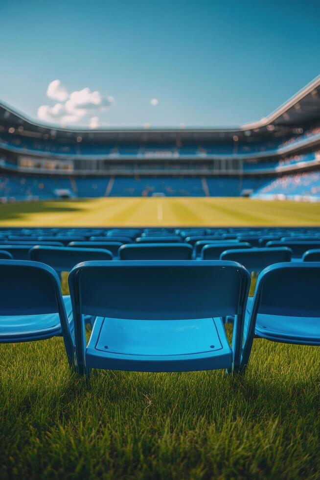 Empty blue stadium seats under a bright sky during an afternoon event at a sports venue photo