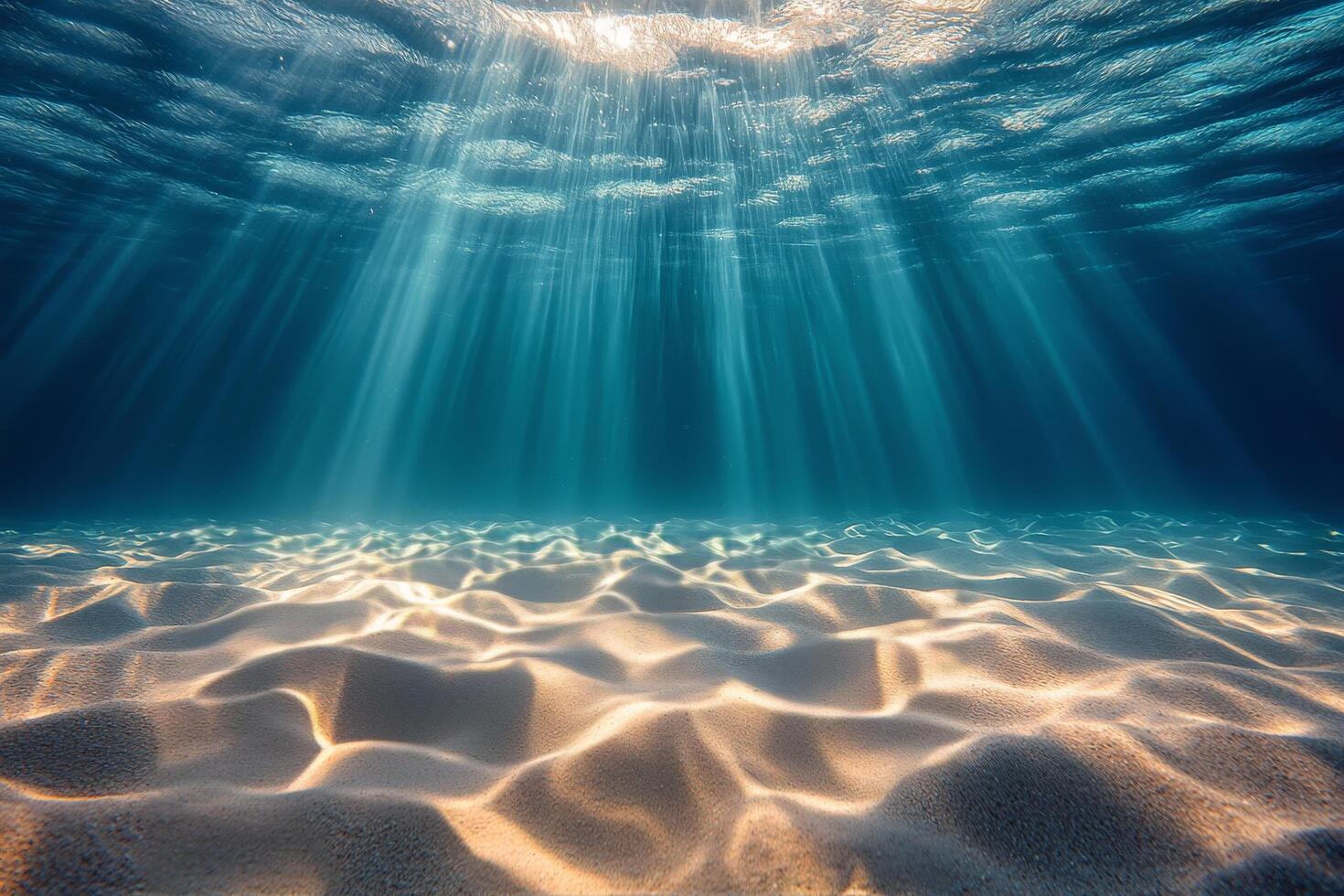 Beneath the ocean waves, sunlight filters through tranquil waters at midday photo