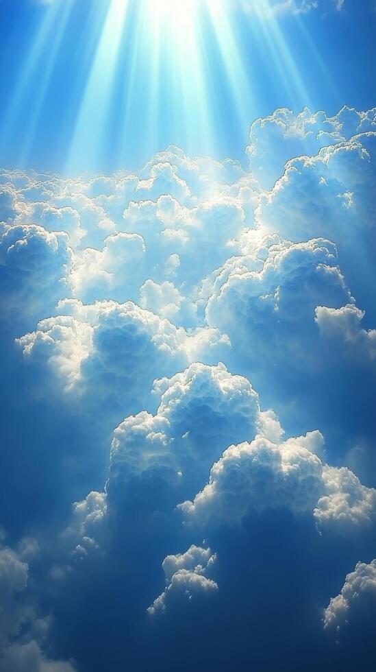 Radiant beams of sunlight breaking through dark storm clouds in a dramatic sky during the day photo