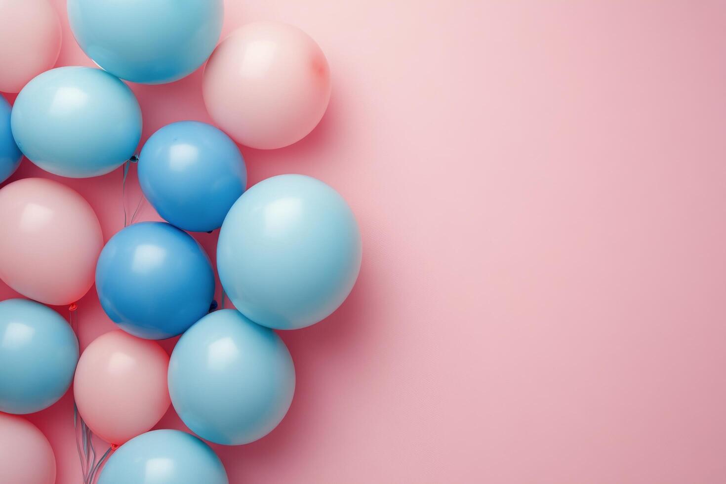 Brightly colored balloons cluster against a soft pink background, creating a playful atmosphere photo