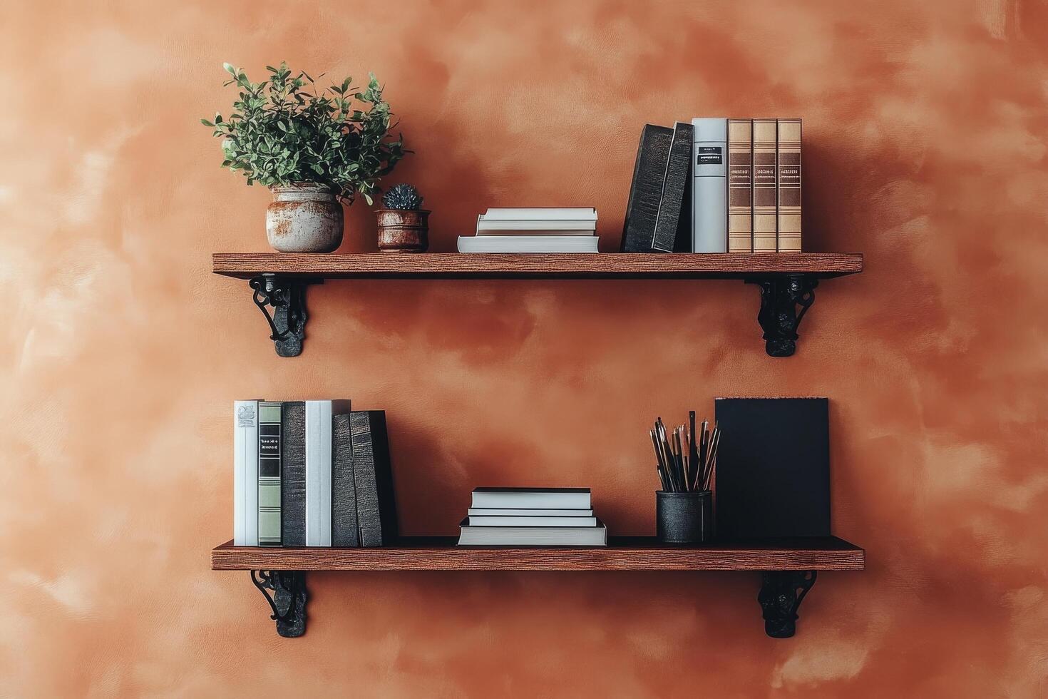 Stylish wooden shelves adorned with books and plants beside a bright orange wall in afternoon light photo