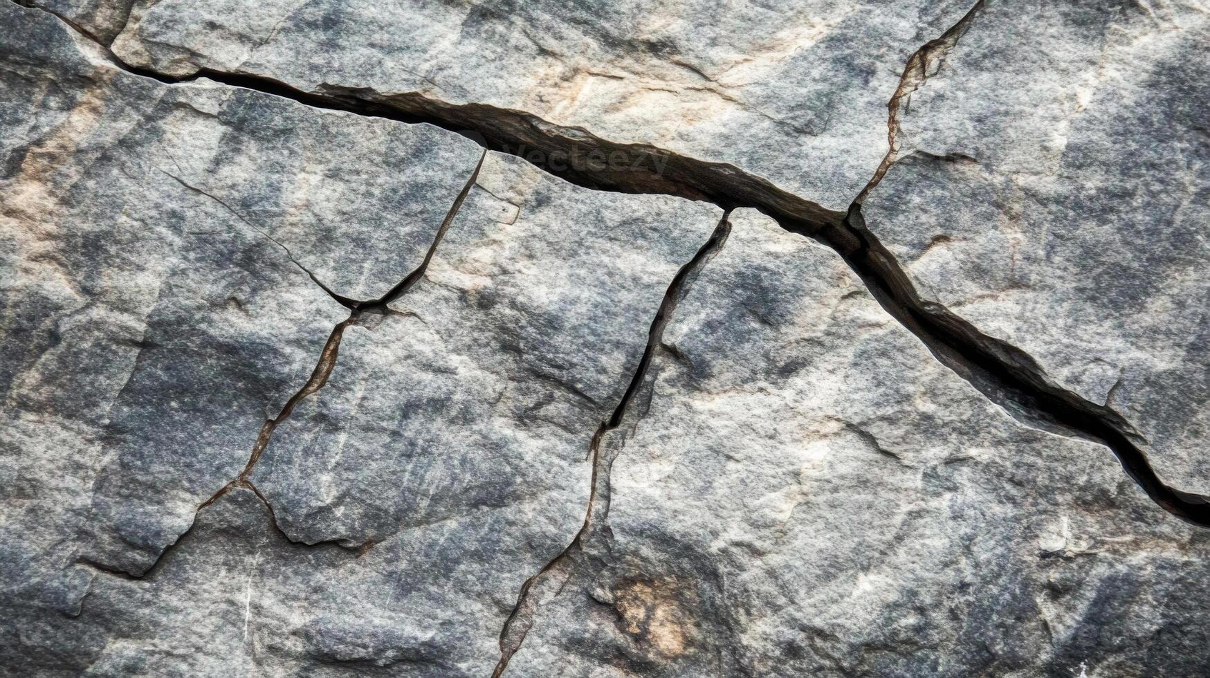 A Close-Up of Gray Rock with a Deep Crack photo