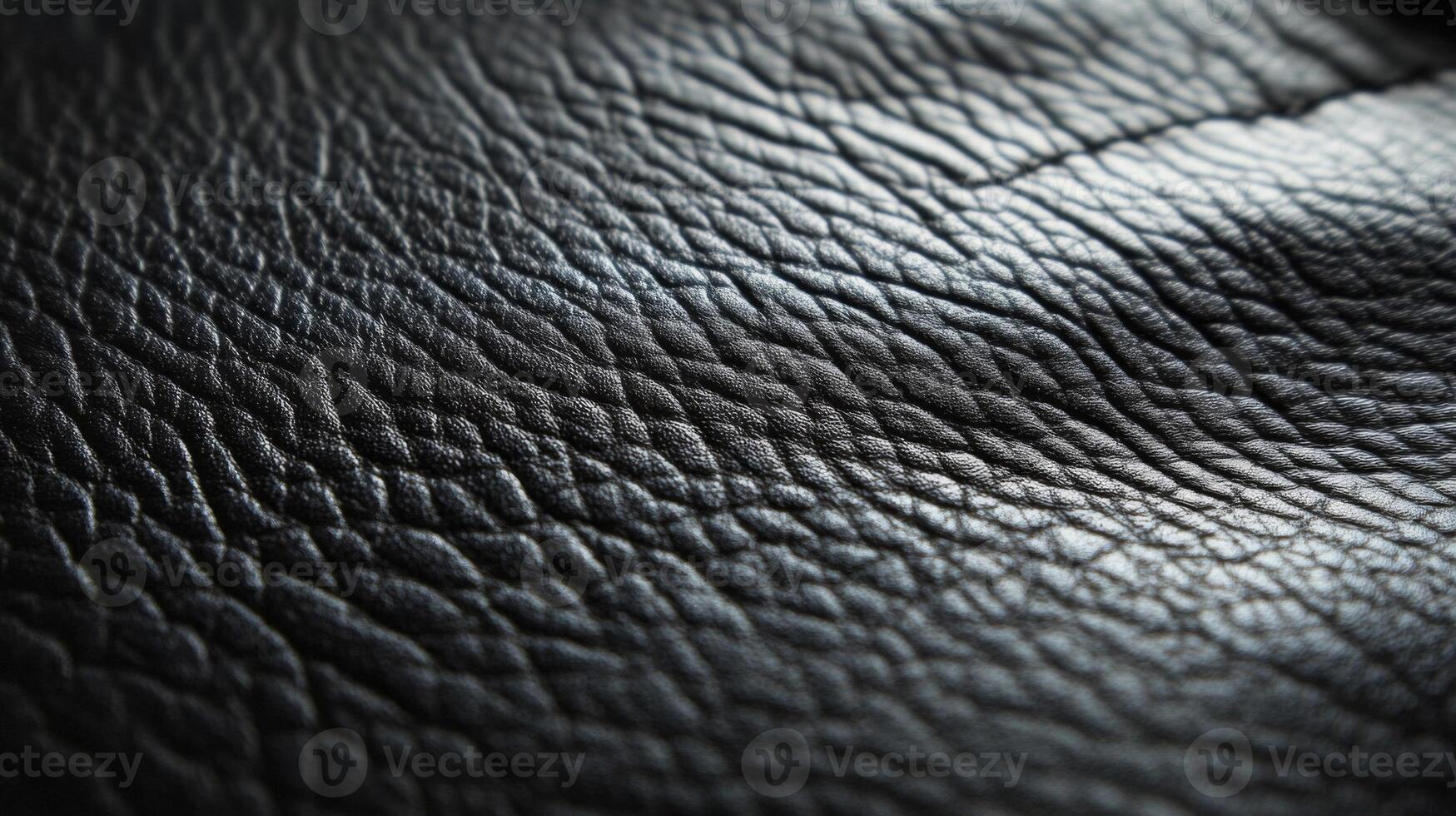 Close-up Texture of Black Leather with a Wavy Pattern photo