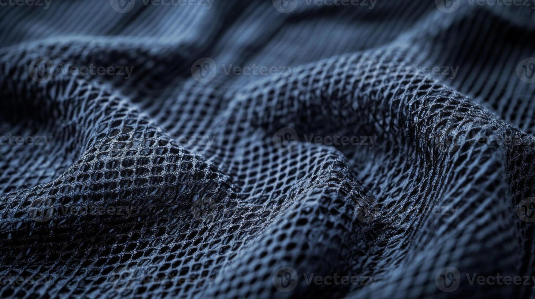 Close-up of Wrinkled Dark Blue Mesh Fabric photo