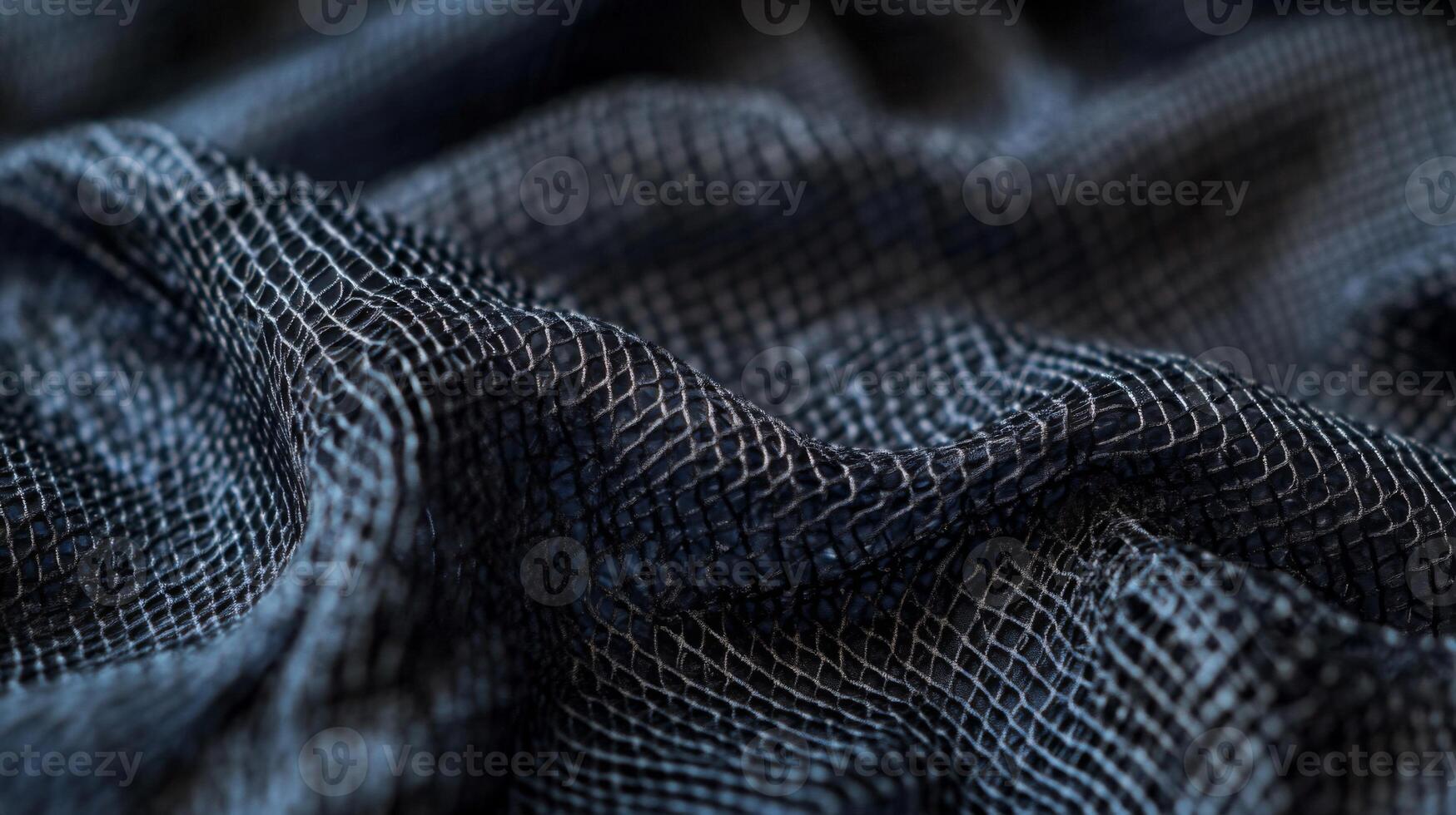 Close-up of a Black Net-Like Fabric with a Distinctive Pattern photo