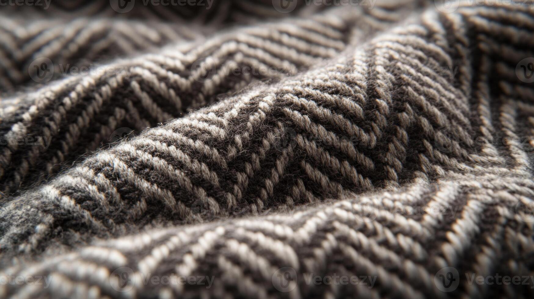 Close-up of Black and White Knitted Fabric with Chevron Pattern photo
