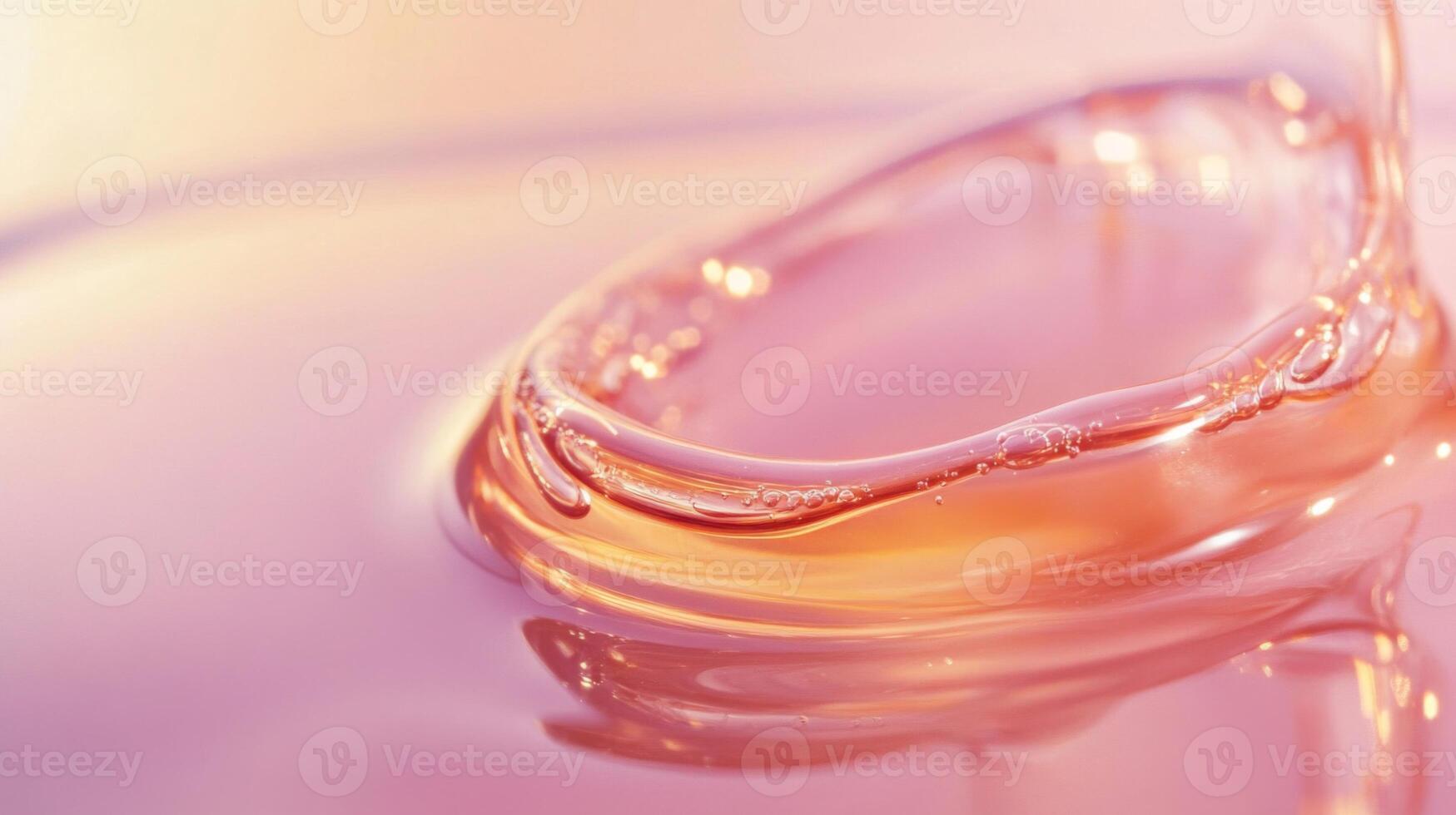 Close-up of a Water Droplet Splashing in a Pink Liquid photo