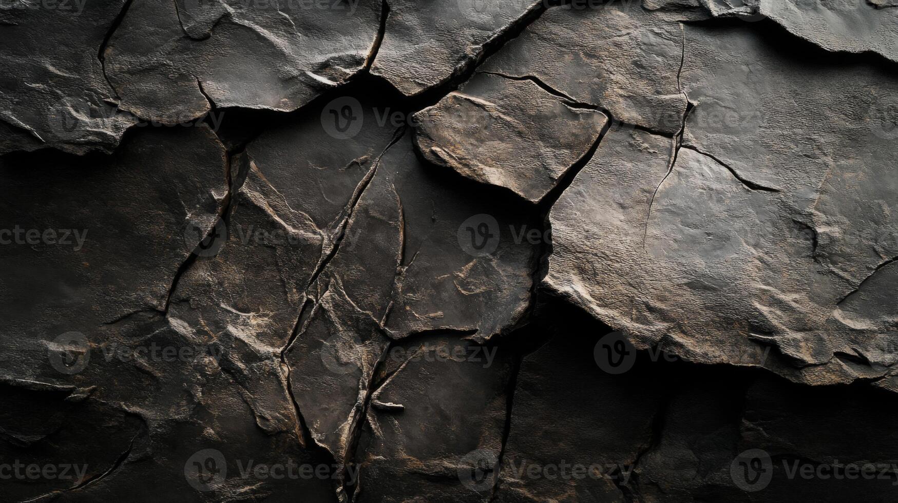 Cracked and Weathered Dark Stone Texture photo