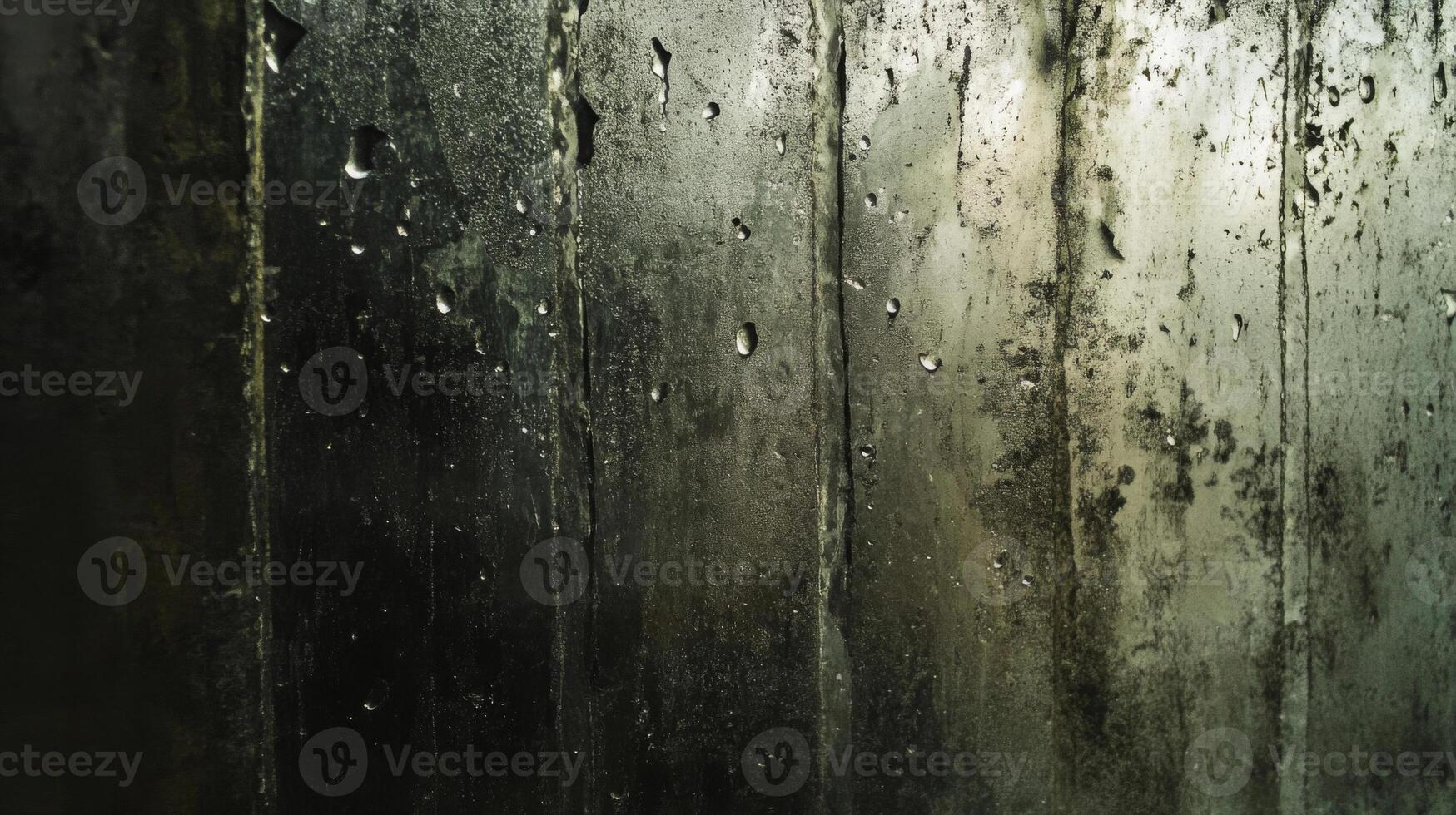 A Windowpane With Rainwater Droplets and Streaks photo