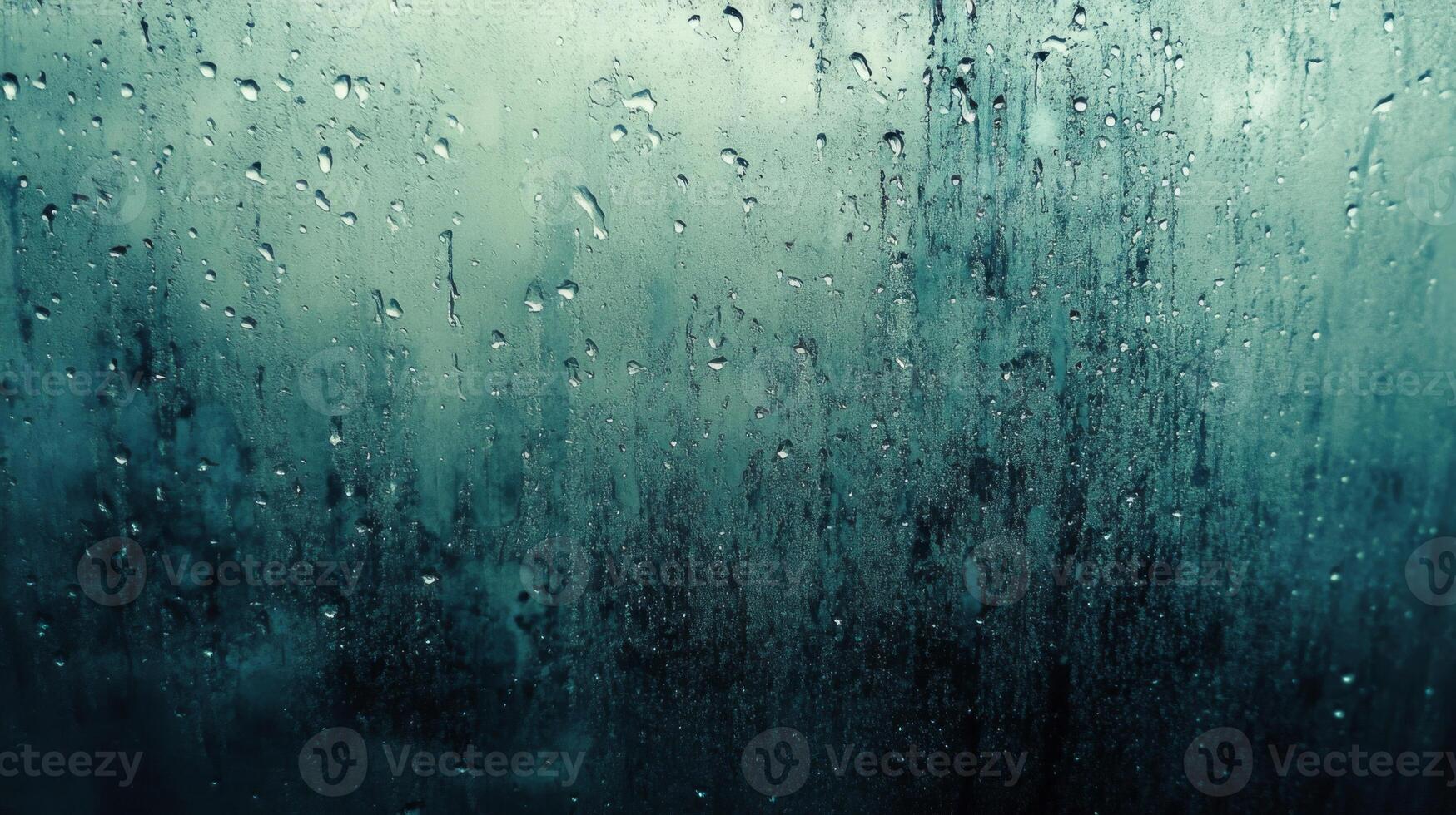 Raindrops on a Windowpane with a Greenish Hue photo