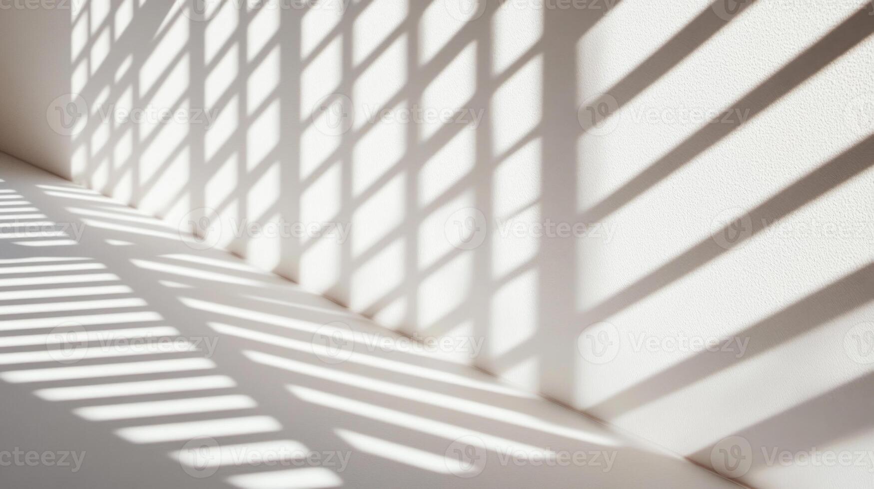 Light and Shadow Patterns on a White Wall photo