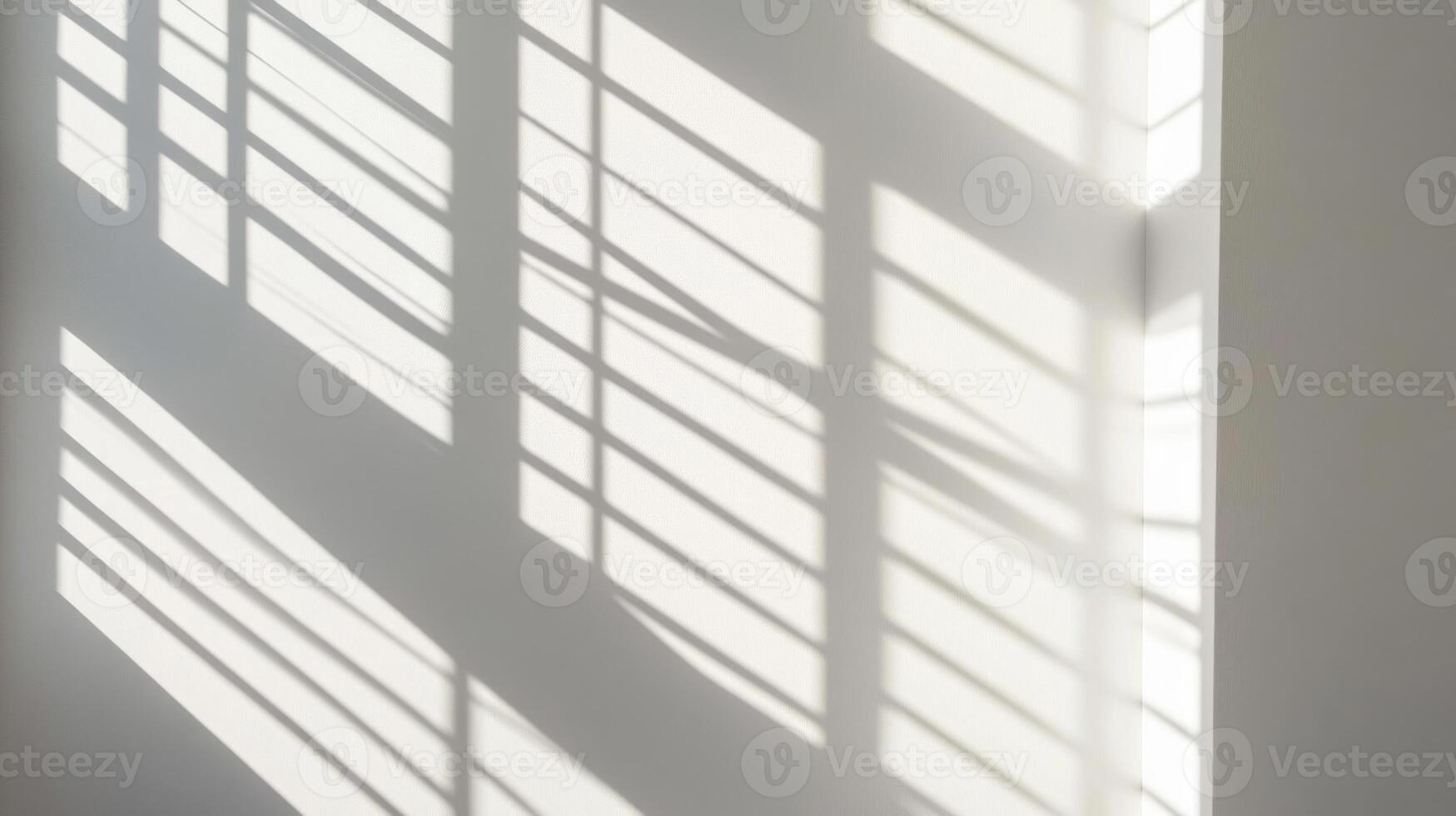 Window Light Casts Horizontal Shadow Lines on a White Wall photo